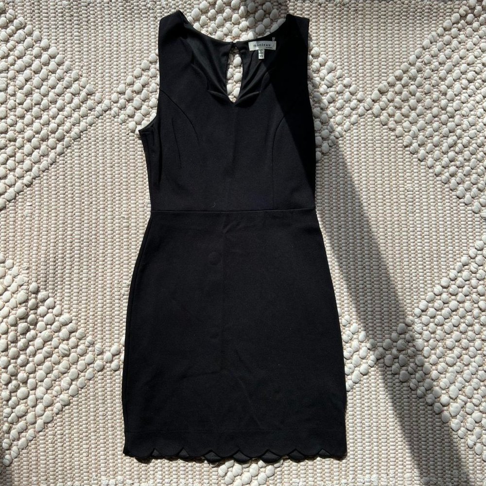 Black tight dress with scalloped hem
